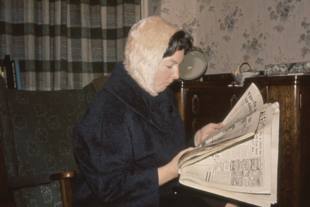 writer researching old newspapers